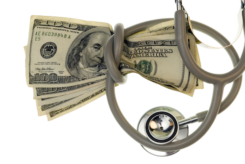 Image of a stethoscope squeezing a pile of cash