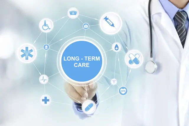 Doctor hand touching LONG TERM CARE sign on virtual screen