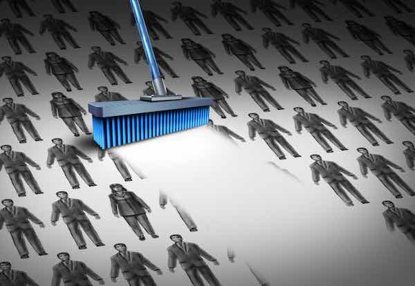 An eraser is wiping out a portion of icons of people depicting job layoffs