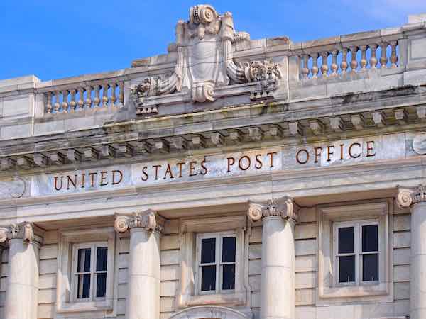 Historic building front labeled 'United States Post Office'