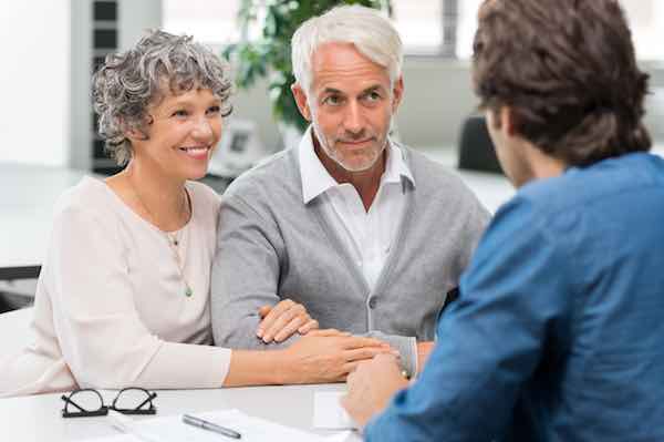 Senior couple meeting with a financial advisor