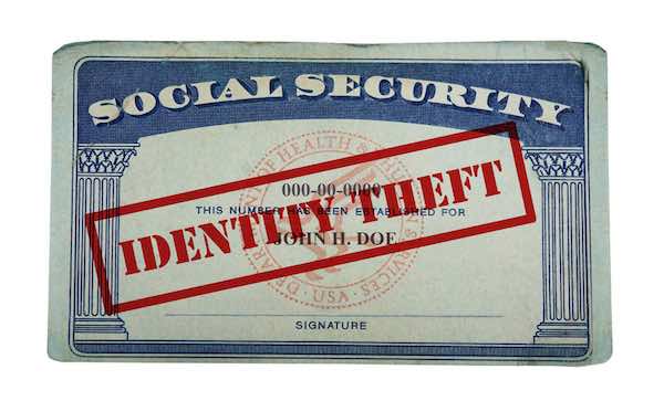 Social Security card stamped with 'identity theft'