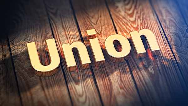The word "Union" is lined with gold letters on wooden planks