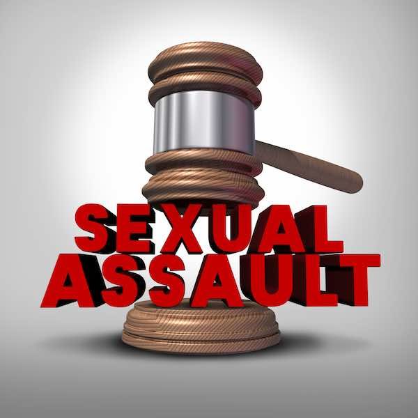 Judge's gavel hitting the words 'sexual assault'