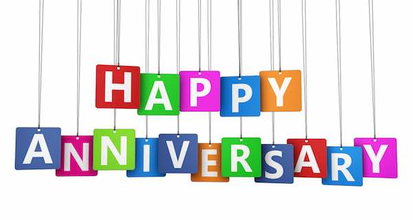 Happy anniversary sign on colorful paper tags