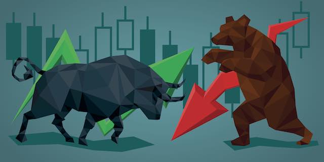 Bull and bear with financial graph depicting possibility of up or down stock market