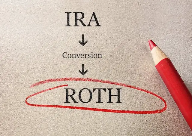 words written on a light brown background separated by downward pointing arrows to show a progression reading 'IRA' -> 'Conversion' -> 'ROTH' depicting a Traditional IRA to Roth IRA conversion