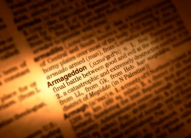 Close up of a dictionary page highlighting the word 'armageddon' and exposing some of its definition