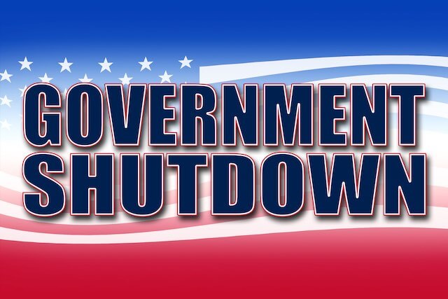 Words 'government shutdown' overlaid on an illustration of an American flag