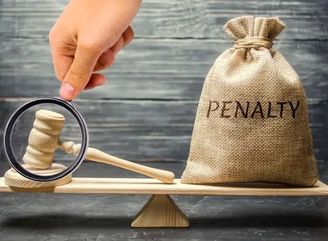 Scale with a wooden judge's gavel on one end being highlighted by a person's hand holding a magnifying glass and a burlap bag labeled 'penalty' at the other end