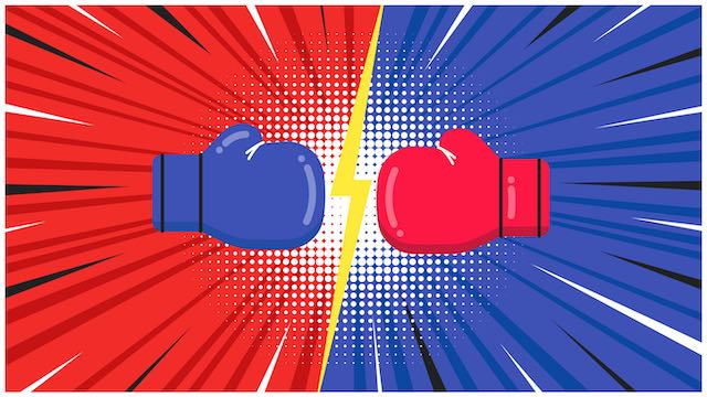 Blue and red boxing gloves facing each other depicting a battle or showdown