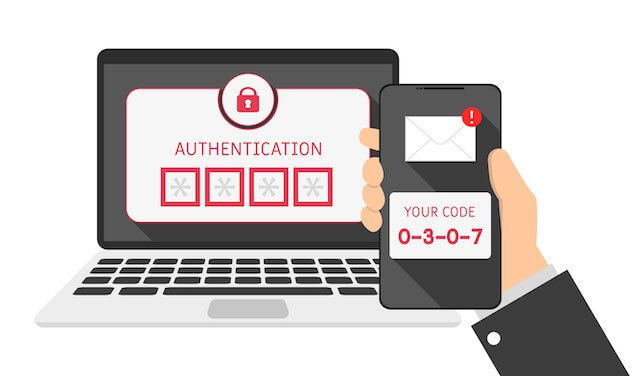 Illustration of a laptop and a person's hand holding a smartphone both of which are prompting for a login code depicting the two factor authentication process