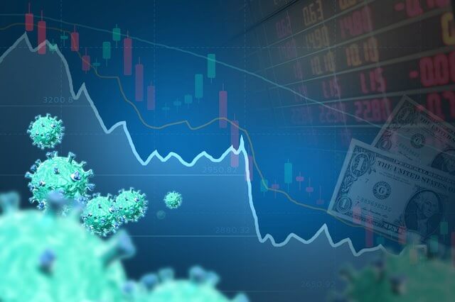 Financial chart on a blue themed background showing a sharp downward trend line with coronavirus cells overlaid on the top left side of it and an image of US cash pictured on the right side