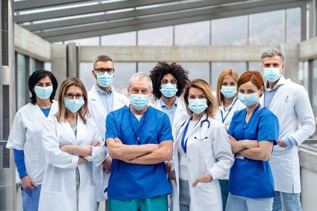 Group of medical workers wearing medical face masks