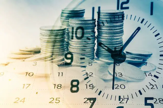 A collage of vertical stacks of coins, a calendar and a clock face