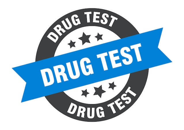 Words 'drug test' written in a circular banner