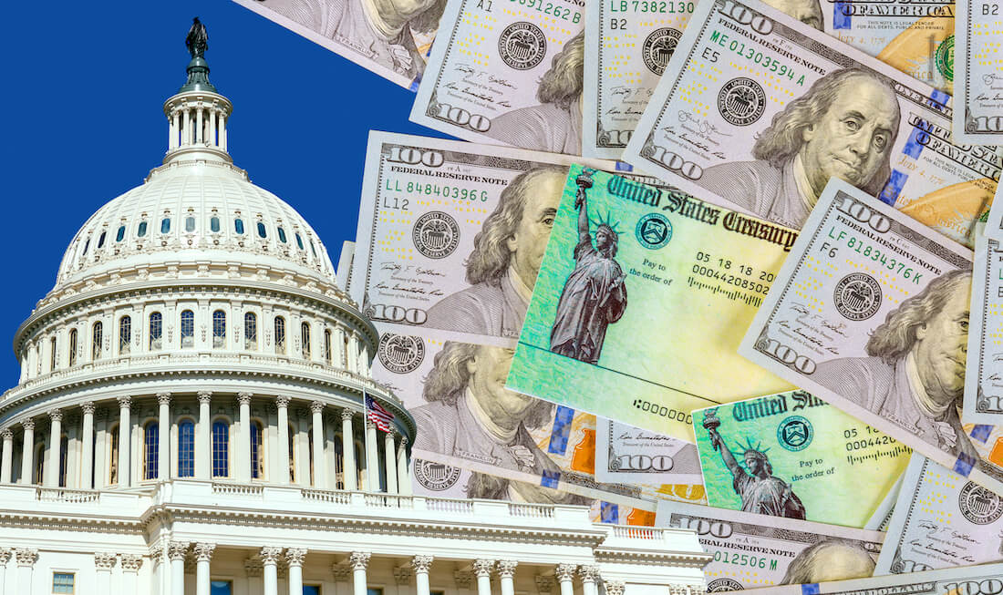 Image of the capitol building (Congress) in Washington, DC surrounded by cash and US Treasury checks