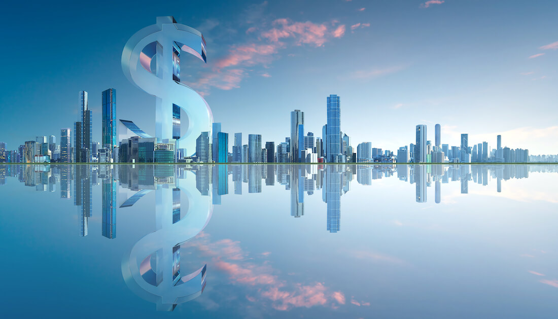 A large 3D dollar sign is pictured behind a harbor front city skyline