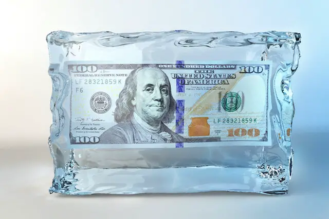 $100 bill in a block of ice