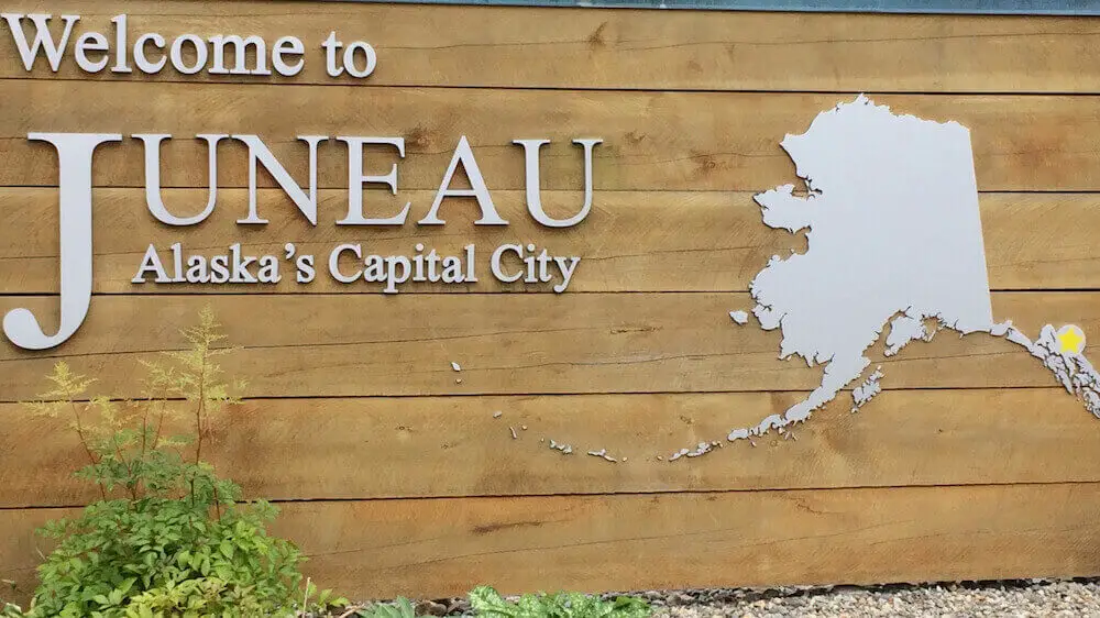 Sign that reads, "Welcome to Juneau Alaska's Capital City"