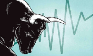 Bull market - bull with his head tilted slight down and horns protruding against a line graph in the background