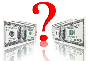 Red question mark between two $100 bills against a white background