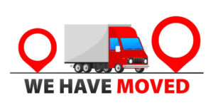Illustration of a moving truck between two GPS markers on a white background above the words 'we have moved'