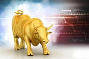 Golden bull overlaid on a financial graph